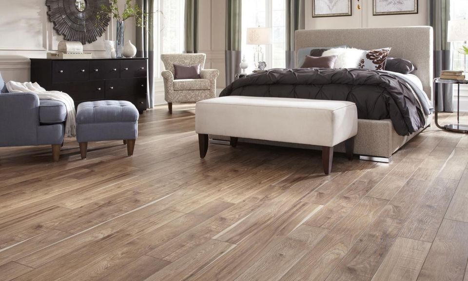 Wood-look flooring in a comfortable bedroom